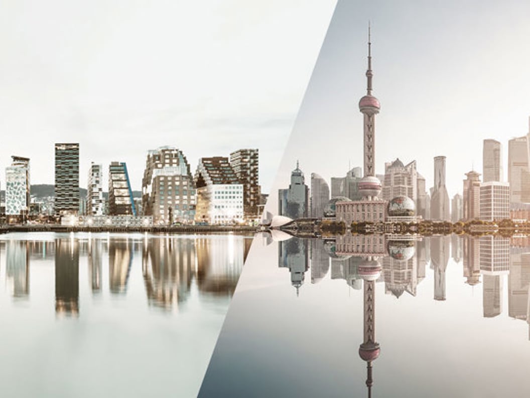 Comparison of modern city skylines: Oslo on the left and Shanghai on the right, both reflected in the water.